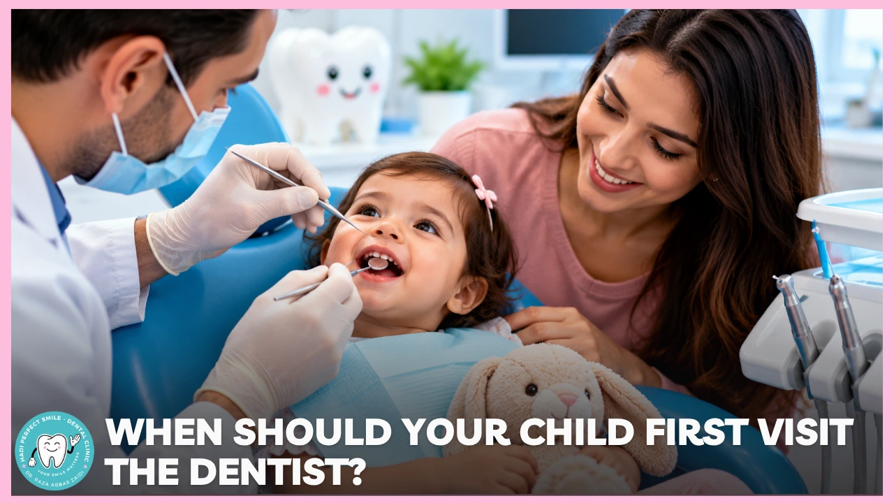 Dentist gently examining a young child's first baby teeth during an early dental checkup with a parent present.